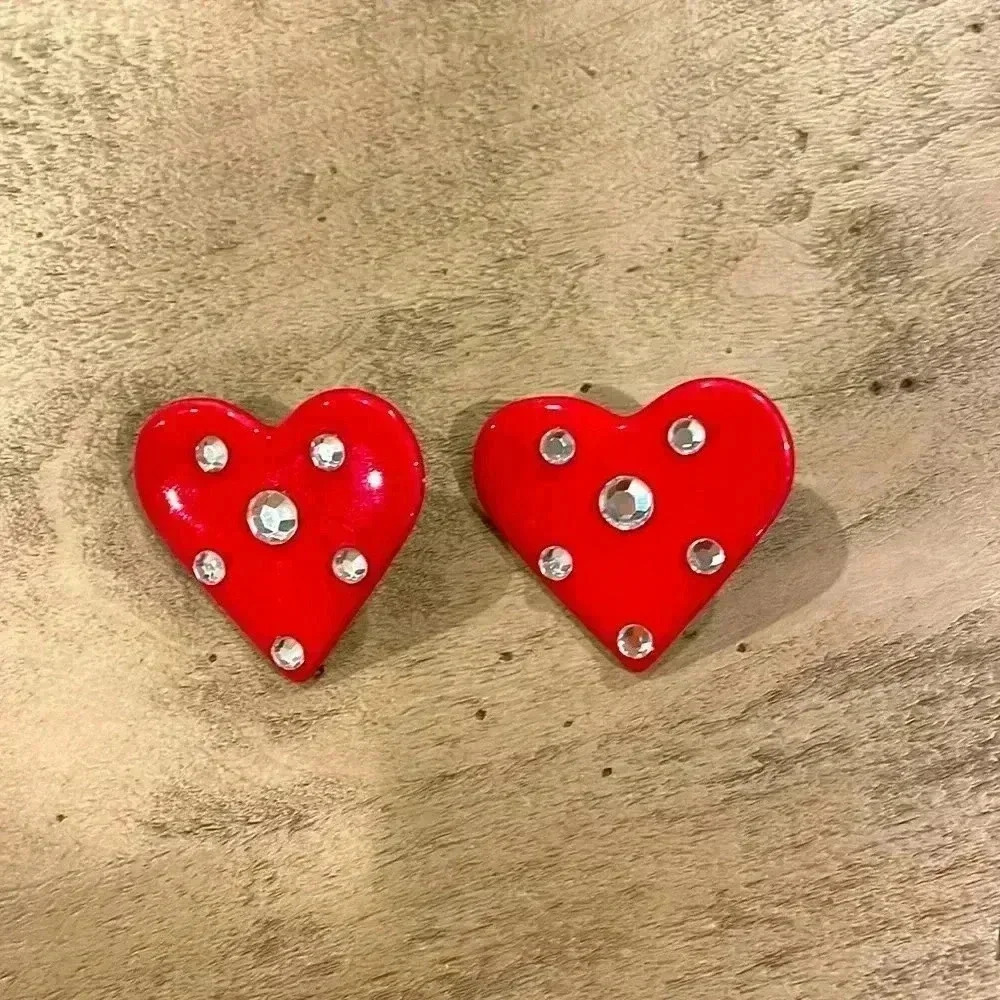Ceramic heart earrings.  Red ceramic with rhinestones.